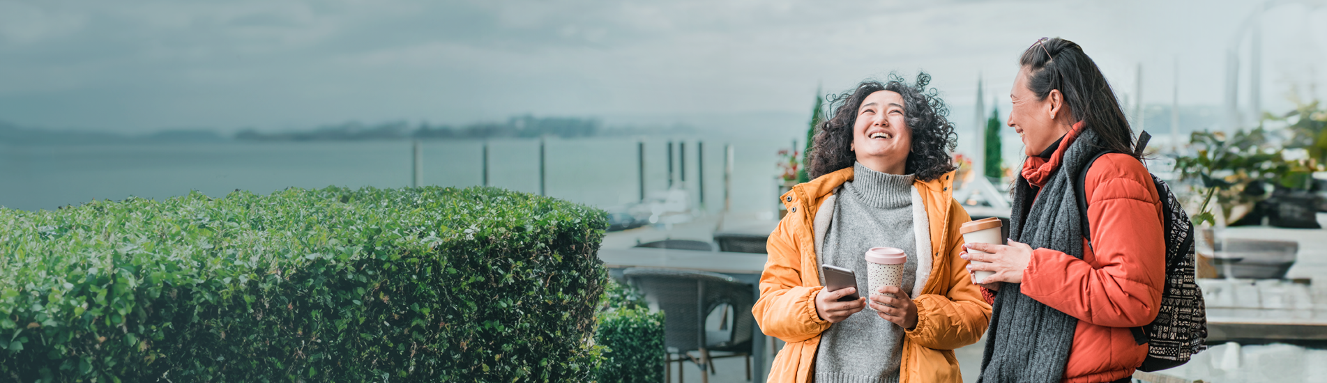 Two friends chatting on a walk
